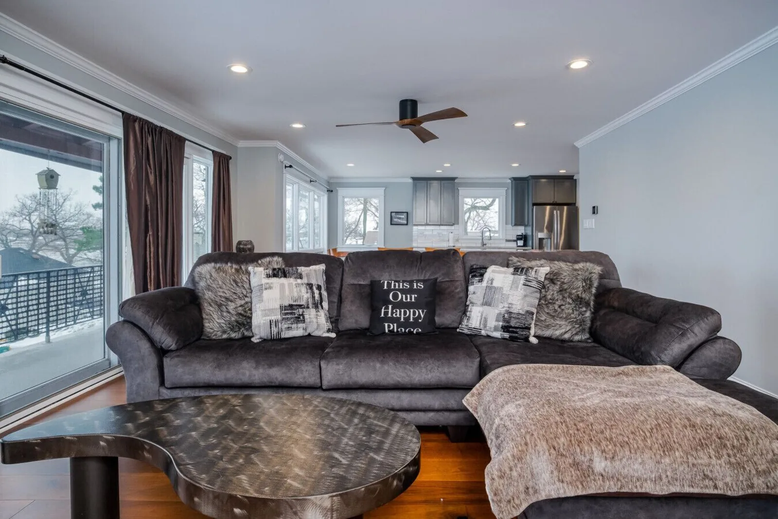 The Penthouse living room with views across the lake