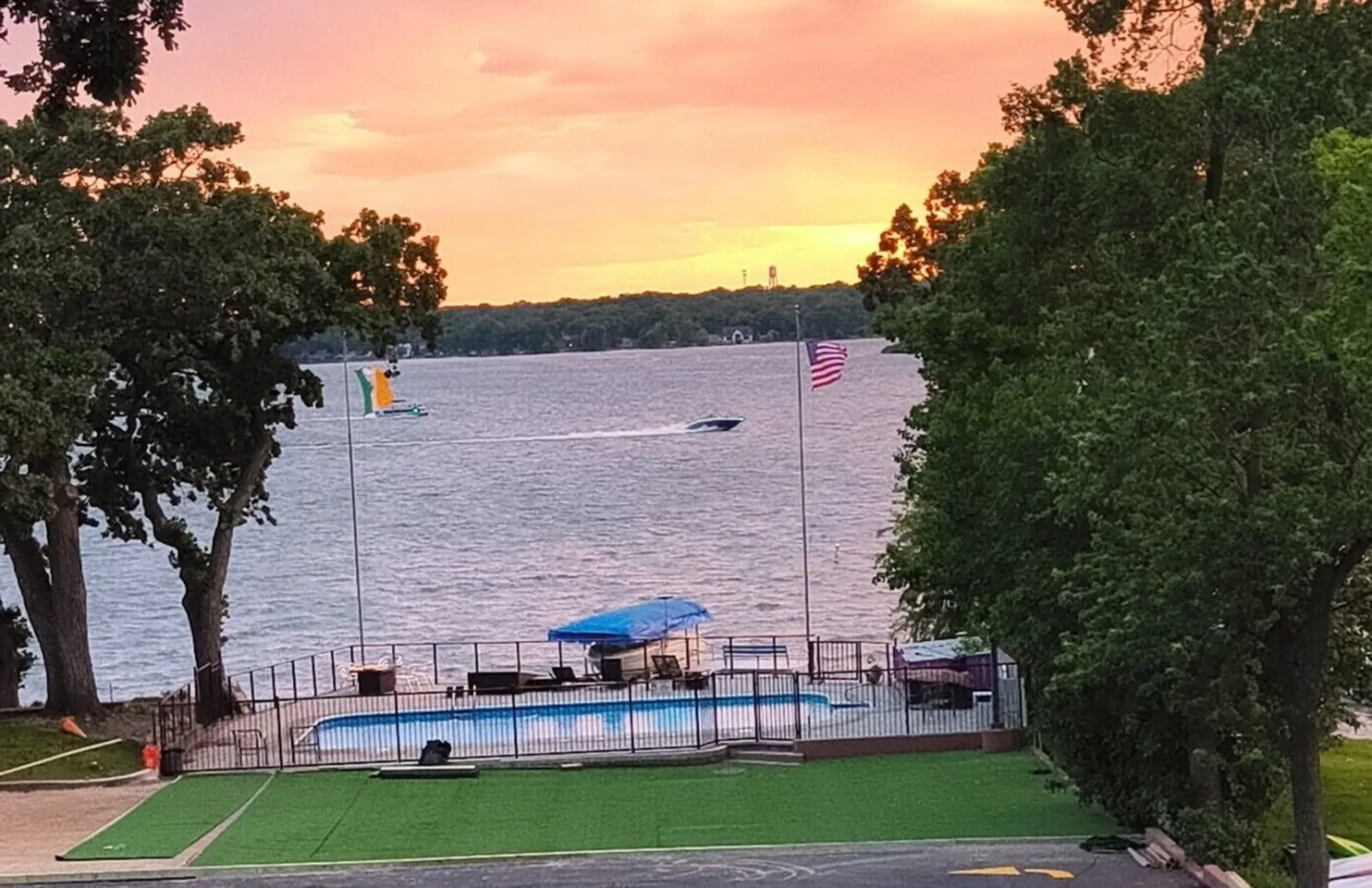 The pool and lake in the warm evening light